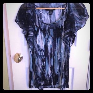 Flutter blouse with sheer detail at neckline